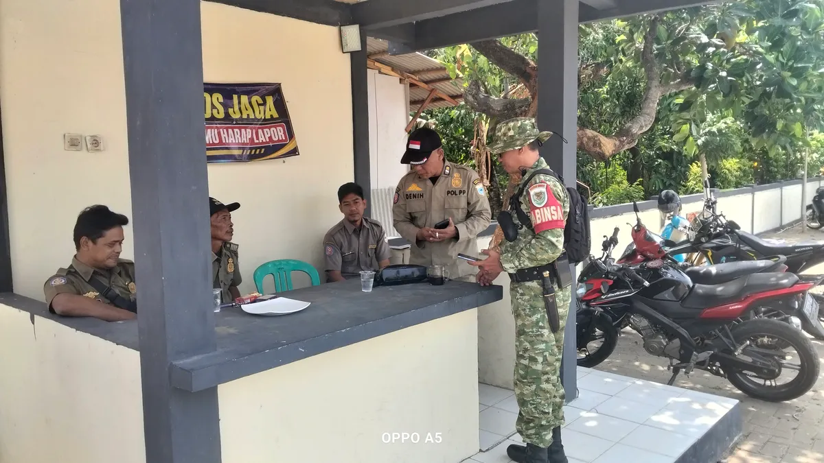 Sertu Yudi dan Satpol PP Kec Panimbang Pantau Sirine Tsunami