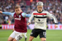 Manchester United memulai tur pramusim dengan kemenangan 2-1 melawan West Ham United
